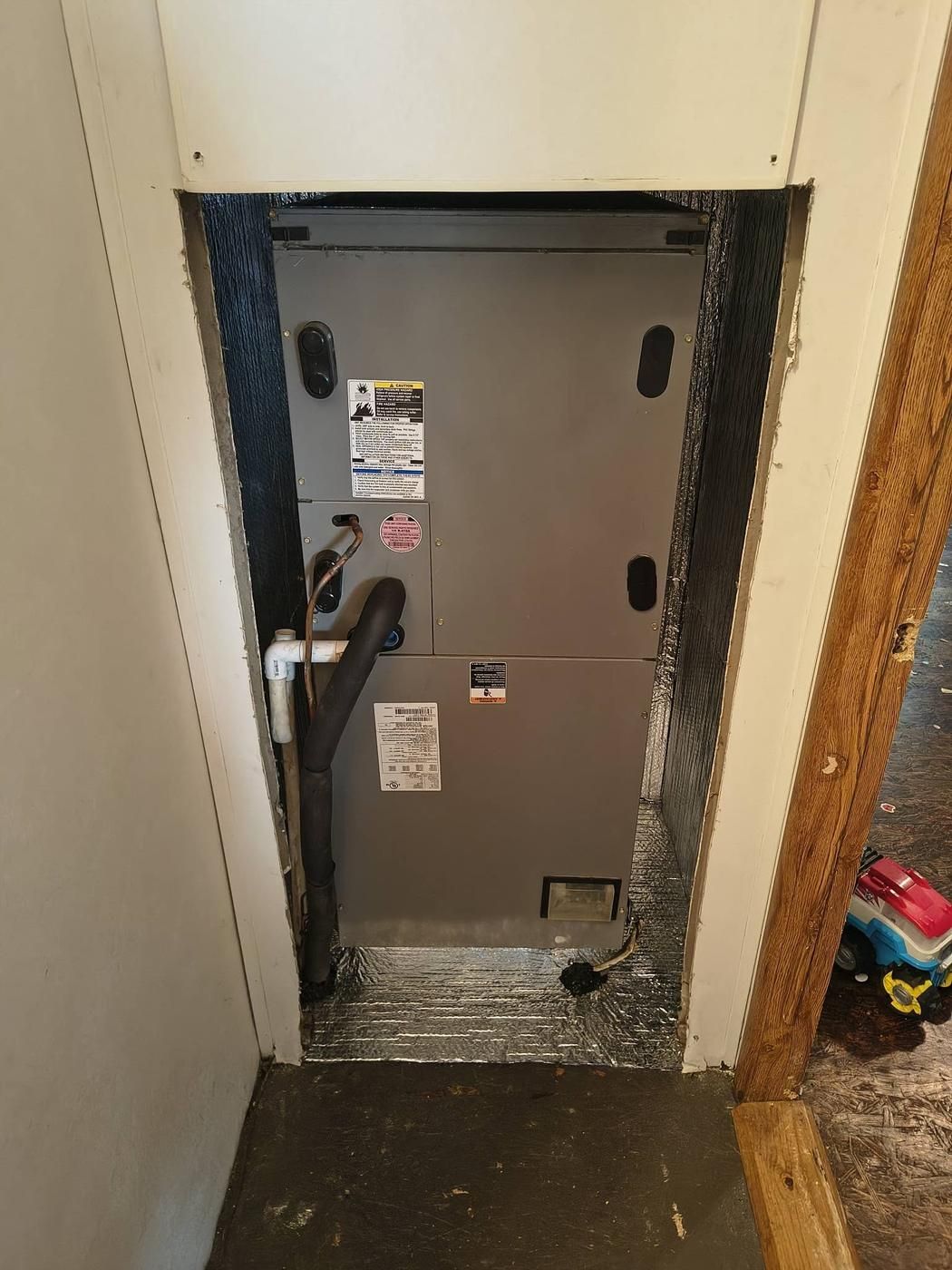 New air handler installed in a hallway closet